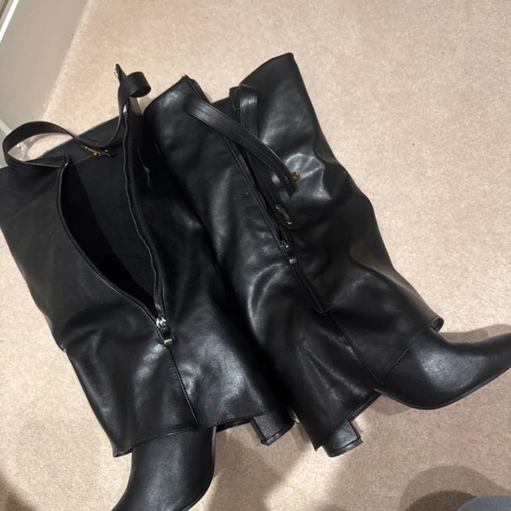 Sleek Black Leather Heeled Boots